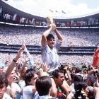Sport. Football 1986 World Cup Final. Azteca Stadium, Mexico. 29th June, 1986. Argentina 3 v West Germany 2.  Argentina's Diego Maradona proudly holds aloft the World Cup trophy amongst masses of fans and photographers.-Not Released (NR)