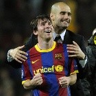 zzzzinte1Barcelona's coach Josep Guardiola (R) celebrates with Barcelona's Argentinian forward Lionel Messi after  the Champions League semi-final second leg football match between Barcelona and Real Madrid at the Camp Nou stadium in Barcelona on May 3, 2011. Barcelona qualified for the Champions League final after drawing 1-1 in their semi-final second leg clash with bitter rivals Real Madrid to progress 3-1 on aggregate.  AFP PHOTO/JAVIER SORIANOzzzz