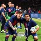 Lionel Messi y Xavi Hernández en la celebración de la Champions League 2014/15